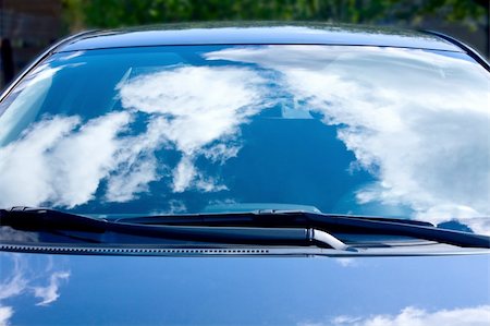 reflection on windshield - blue sky and clouds reflected in a car Stock Photo - Budget Royalty-Free & Subscription, Code: 400-05288164