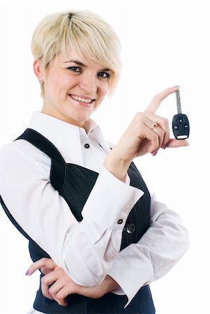 simsearch:400-07445673,k - Portrait of businesswoman with car key at isolated background. Photographie de stock - Aubaine LD & Abonnement, Code: 400-05288414