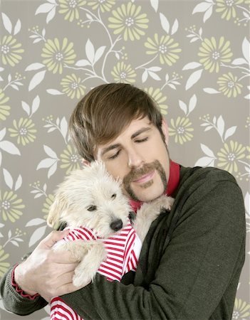 dog man bizarre - geek retro man holding dog silly couple on wallpaper Stock Photo - Budget Royalty-Free & Subscription, Code: 400-05288425