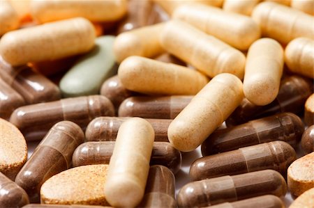 Medicinal pills piled up a bunch of closeup Stock Photo - Budget Royalty-Free & Subscription, Code: 400-05288558