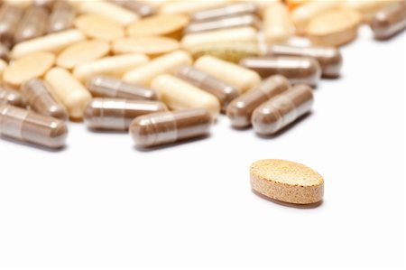 Medicinal pills piled up a bunch of closeup Stock Photo - Budget Royalty-Free & Subscription, Code: 400-05288560