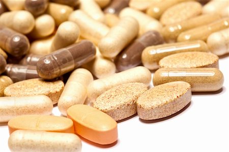 Medicinal pills piled up a bunch of closeup Stock Photo - Budget Royalty-Free & Subscription, Code: 400-05288563