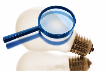 simsearch:400-04774950,k - Magnifying Glass and Light Bulb on White Background Photographie de stock - Aubaine LD & Abonnement, Code: 400-05289015