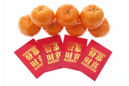 simsearch:400-04775746,k - Mandarins and Red Packets on Isolated White Background Stock Photo - Budget Royalty-Free & Subscription, Code: 400-05289019