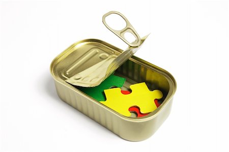 Jigsaw Puzzle Pieces in Tin Can on White Background Photographie de stock - Aubaine LD & Abonnement, Code: 400-05289231