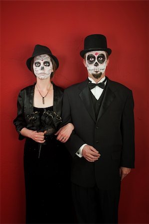 A classy couple with freaky make up for Halloween or All Souls Day Stock Photo - Budget Royalty-Free & Subscription, Code: 400-05289344