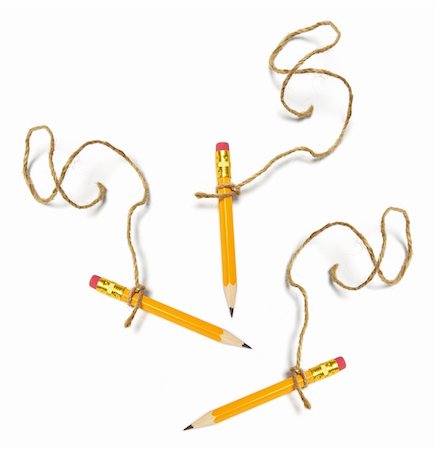 simsearch:400-05290430,k - Pencils Tied with Strings on White Background Photographie de stock - Aubaine LD & Abonnement, Code: 400-05289447