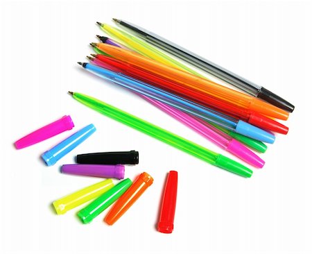 simsearch:400-05288977,k - Ball Pens and Caps on White Background Photographie de stock - Aubaine LD & Abonnement, Code: 400-05289454