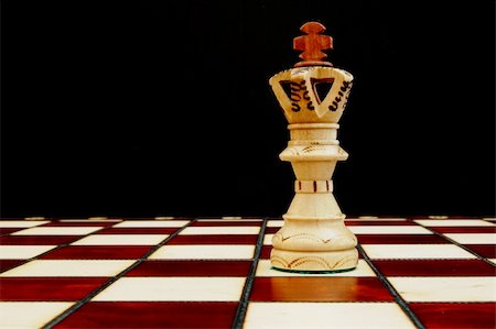 simsearch:400-04775983,k - chess pieces on chess board showing concept for success and power Stock Photo - Budget Royalty-Free & Subscription, Code: 400-05289565