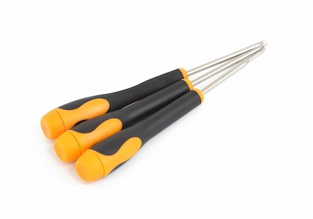 simsearch:400-04649780,k - A set of three yellow and black screwdriver on a white background Foto de stock - Super Valor sin royalties y Suscripción, Código: 400-05280356