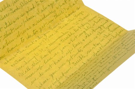 simsearch:614-03697669,k - Close up of a handwritten letter written in 1975 on yellow paper that mentions a hot summer with lots of bugs. Isolated on a white background with a clipping path. Foto de stock - Super Valor sin royalties y Suscripción, Código: 400-05280557