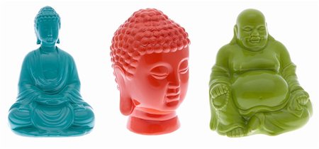 simsearch:400-04755656,k - Three brightly colored buddha statues.  Seated buddha in blue.  Buddha head in orange.  Fat buddha in green.  File includes clipping path. Stock Photo - Budget Royalty-Free & Subscription, Code: 400-05280603