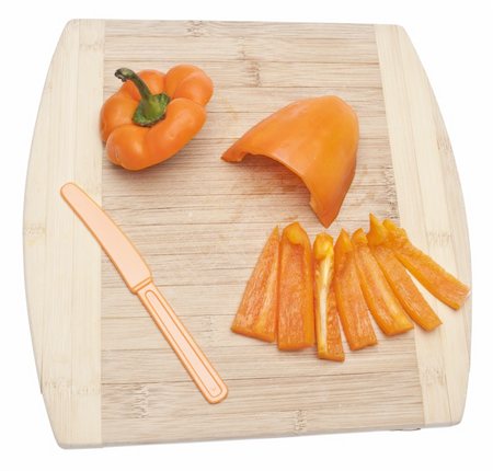 simsearch:400-04300939,k - Vibrant Orange Pepper Slices on a Cutting Board Isolated on White with a Clipping Path. Stock Photo - Budget Royalty-Free & Subscription, Code: 400-05280717