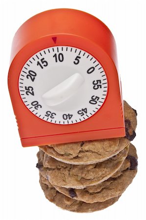 Timer with Cookies in a Food Concept Image Isolated on White with a Clipping Path. Stock Photo - Budget Royalty-Free & Subscription, Code: 400-05280890