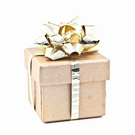 On white-gold gift box with gold ribbon. Fotografie stock - Microstock e Abbonamento, Codice: 400-05281553