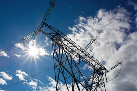 skylight (artist) - Electricity power transmission tower with sun and clouds Stock Photo - Budget Royalty-Free & Subscription, Code: 400-05281578