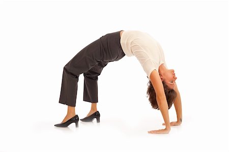 Young businesswoman in suit doing yoga Stock Photo - Budget Royalty-Free & Subscription, Code: 400-05281830