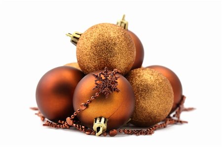 simsearch:400-07920008,k - Christmas arrangement with gold and brown ornaments isolated on white background. Shallow dof Fotografie stock - Microstock e Abbonamento, Codice: 400-05282497