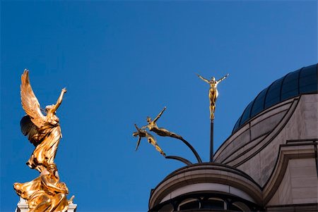 Five gold women high up in London sky blue. Personal collage of my own. Stock Photo - Budget Royalty-Free & Subscription, Code: 400-05282920