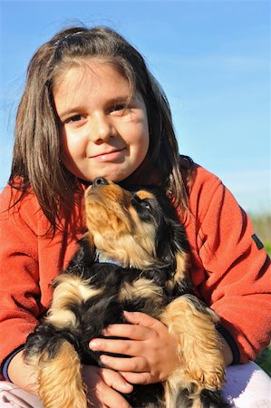 simsearch:400-05888313,k - portrait of a puppy purebred english cocker with little girl Photographie de stock - Aubaine LD & Abonnement, Code: 400-05282981