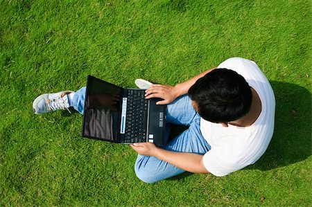 man using laptop in a garden outdoor. Stock Photo - Budget Royalty-Free & Subscription, Code: 400-05283259