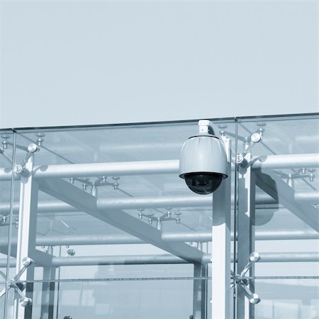 surveillance camera - camera on the modern building outdoor. Foto de stock - Super Valor sin royalties y Suscripción, Código: 400-05283296