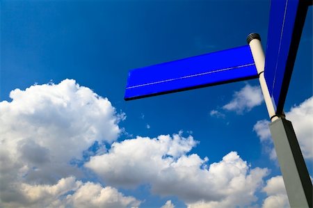 simsearch:400-05108001,k - blue wooden road sign on the blue sky background outdoor. Stock Photo - Budget Royalty-Free & Subscription, Code: 400-05283309