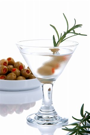 simsearch:400-04616101,k - Classic Martini with olives filled by red papper inside and rosmarin isolated on a white background Foto de stock - Super Valor sin royalties y Suscripción, Código: 400-05283514