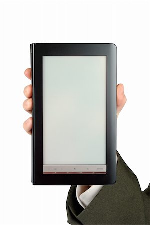 simsearch:400-08501429,k - Male hand suit dressed holding electronic book isolated with clipping path over white Photographie de stock - Aubaine LD & Abonnement, Code: 400-05283585