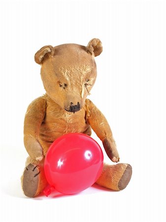 furry teddy bear - 1950 teddy bear with a red balloon. Stock Photo - Budget Royalty-Free & Subscription, Code: 400-05294203