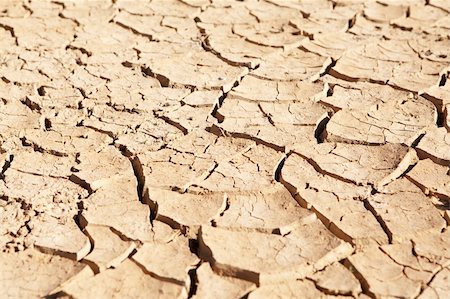 Dry and cracked mud in dried up waterhole Stock Photo - Budget Royalty-Free & Subscription, Code: 400-05294496