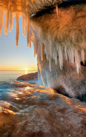 simsearch:400-06176310,k - stone with ice with the sun rising on the horizon Stock Photo - Budget Royalty-Free & Subscription, Code: 400-05294751