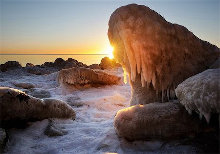 simsearch:400-06176310,k - stones at the beach filled with ice at sunrise Stock Photo - Budget Royalty-Free & Subscription, Code: 400-05294753