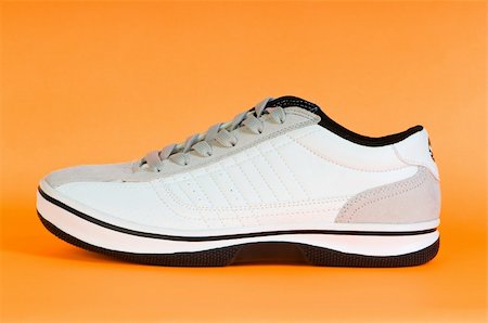 simsearch:400-04750303,k - Sport shoes isolated on the white background Photographie de stock - Aubaine LD & Abonnement, Code: 400-05294774