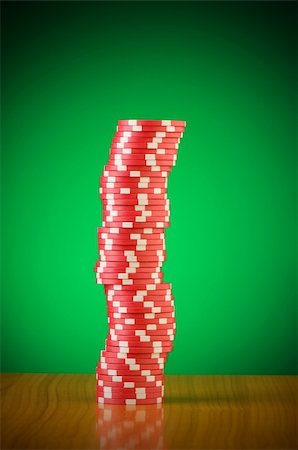 simsearch:400-04736708,k - Stack of casino chips against gradient background Stockbilder - Microstock & Abonnement, Bildnummer: 400-05294815