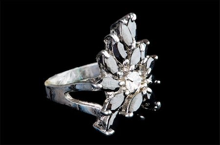 simsearch:400-05297829,k - Jewellery ring isolated on the black background Photographie de stock - Aubaine LD & Abonnement, Code: 400-05294852