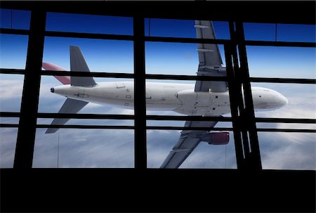 simsearch:400-05882817,k - the airplane on  the blue sky background. Photographie de stock - Aubaine LD & Abonnement, Code: 400-05295472