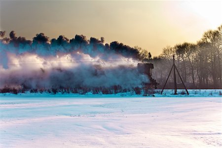 simsearch:400-07680071,k - Vintage steam train starting from the station, wintertime Photographie de stock - Aubaine LD & Abonnement, Code: 400-05296101