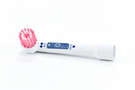 simsearch:400-04552289,k - Electric toothbrush head on white Foto de stock - Super Valor sin royalties y Suscripción, Código: 400-05296804