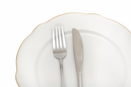 simsearch:400-04013113,k - empty plate fork spoon photo on the white Photographie de stock - Aubaine LD & Abonnement, Code: 400-05297019