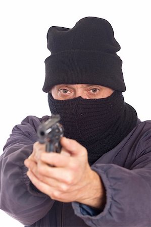 simsearch:400-08551381,k - Thief Aiming a Gun on a Robbery Fotografie stock - Microstock e Abbonamento, Codice: 400-05297179