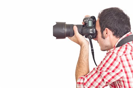 shooting the head with the hand - Young Man Photographer Taking Photos Stock Photo - Budget Royalty-Free & Subscription, Code: 400-05297170