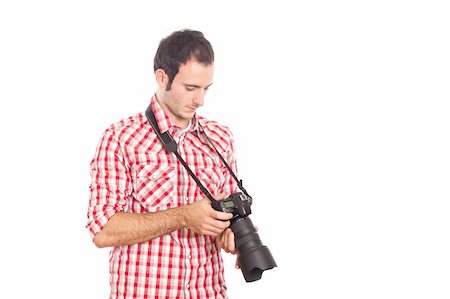 shooting the head with the hand - Young Man Photographer Taking Photos Stock Photo - Budget Royalty-Free & Subscription, Code: 400-05297171