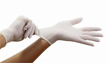 Woman's hands putting on surgical gloves-isolation over white background with clipping path. Stock Photo - Budget Royalty-Free & Subscription, Code: 400-05297491