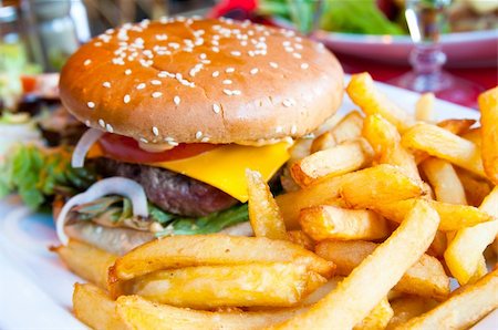 simsearch:400-05330097,k - Cheese burger - American cheese burger with fresh salad Stock Photo - Budget Royalty-Free & Subscription, Code: 400-05297576