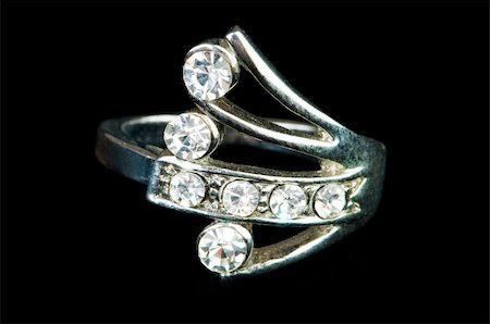 diamonds on black background - Jewellery ring isolated on the black background Photographie de stock - Aubaine LD & Abonnement, Code: 400-05297829