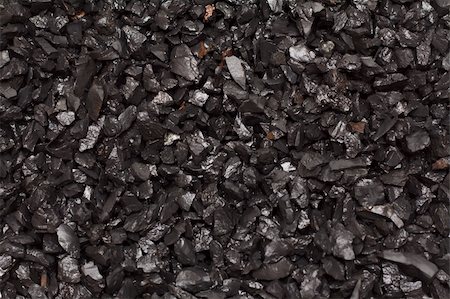 simsearch:400-04380870,k - Black coal, small factions put by background Photographie de stock - Aubaine LD & Abonnement, Code: 400-05298088