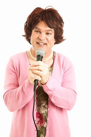 Humorous photo of a man dressed as a frumpy female singer.  Isolated on white. Stock Photo - Budget Royalty-Free & Subscription, Code: 400-05298114