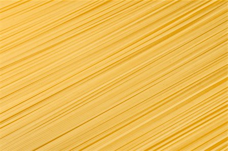 uncooked spaghetti close-up as a decorative background Stock Photo - Budget Royalty-Free & Subscription, Code: 400-05298444