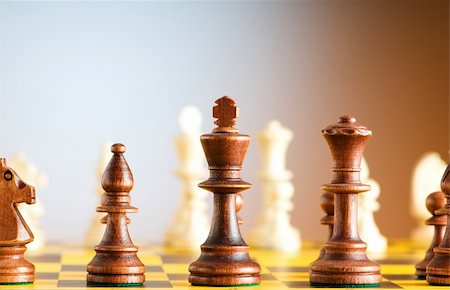 simsearch:400-04764021,k - Set of chess figures on the playing board Foto de stock - Super Valor sin royalties y Suscripción, Código: 400-05298802